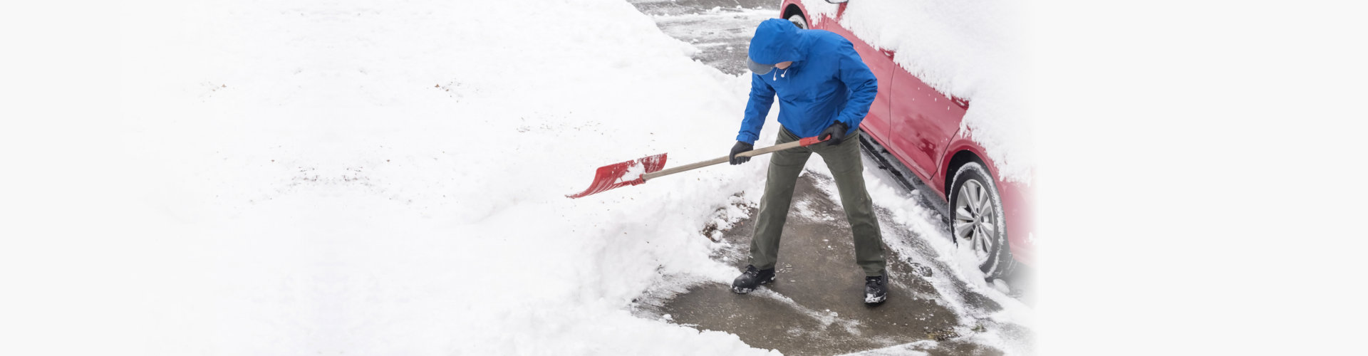 man removing some snow