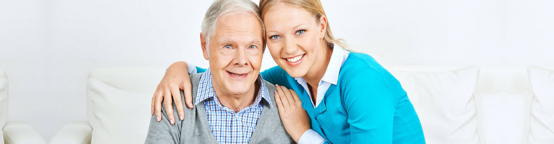 man and caregiver smiling