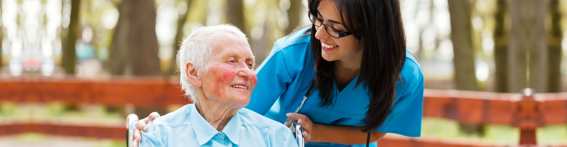 caregiver and elderly talking